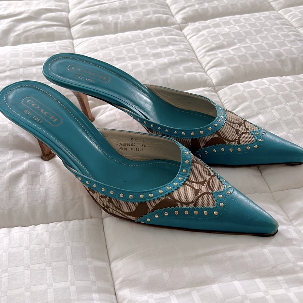 Coach heeled mules.